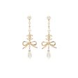 Chanel pearl   cc logo   bow tie drop earrings gold tone Discount